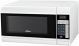 11613 - OSTER .9CF MICROWAVE